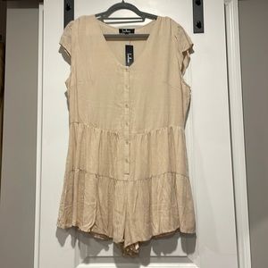 Beige romper with flounce details